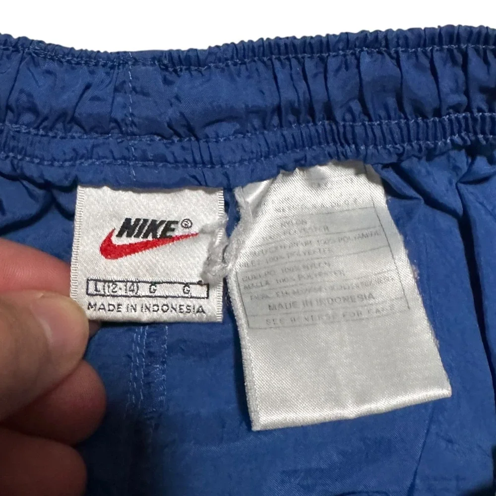 Vintage 90s Nike Nylon Embroidered Swoosh Athletic‎ Distressed Shorts Youth L
